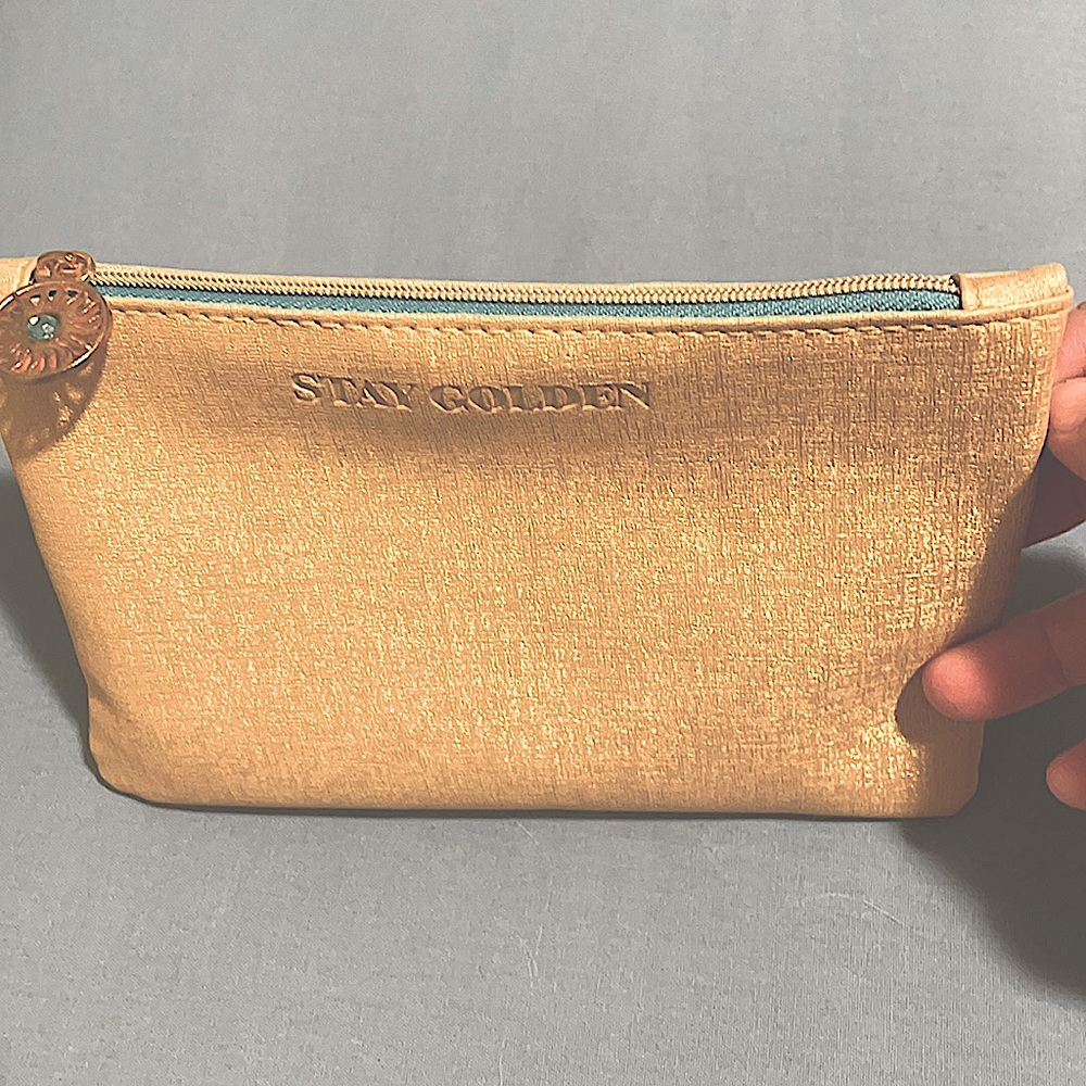 3 for $10 or FREE with $50 purchase! 🧡 Golden Shimmery Makeup Bag